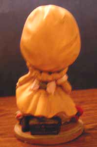 Ceramic Girl with Big Yellow Hat with Spinning Wheel  Pic 2