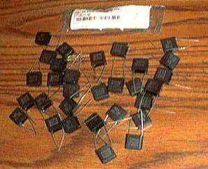 Lot of 35: 250/275V .1uF Interference Suppressor Radial Capacitors Pic 1